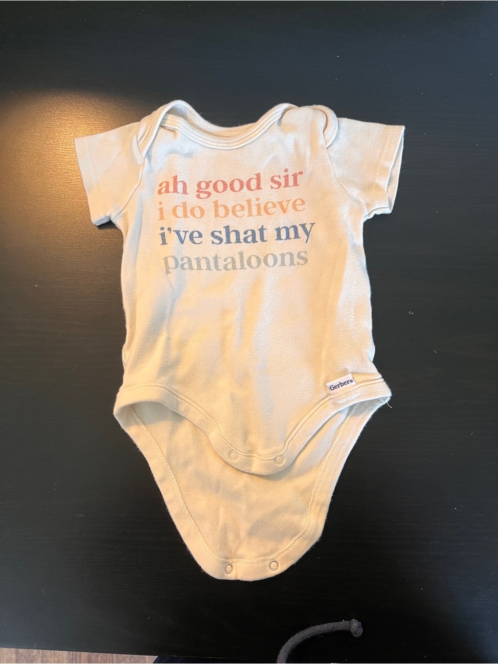 [$2 in a bundle] Gerber’s funny beige onesie 3-6 mo